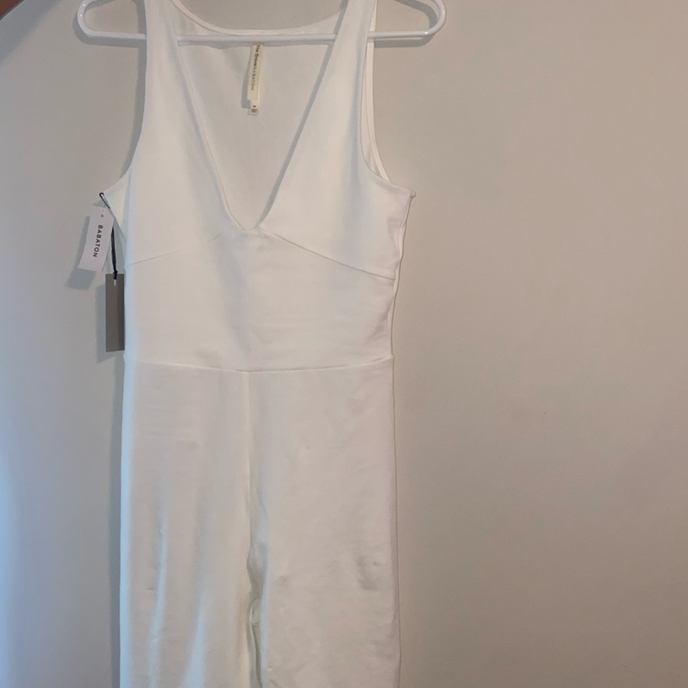 Brand New never worn white jumpsuit from Aritzia in the size M